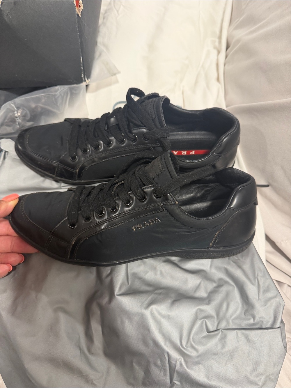 Women Prada Black Low-Top Leather Sneakers with Side Logo
No refund
